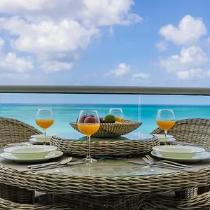 https://azure-beach-residences.comcaribbean.com